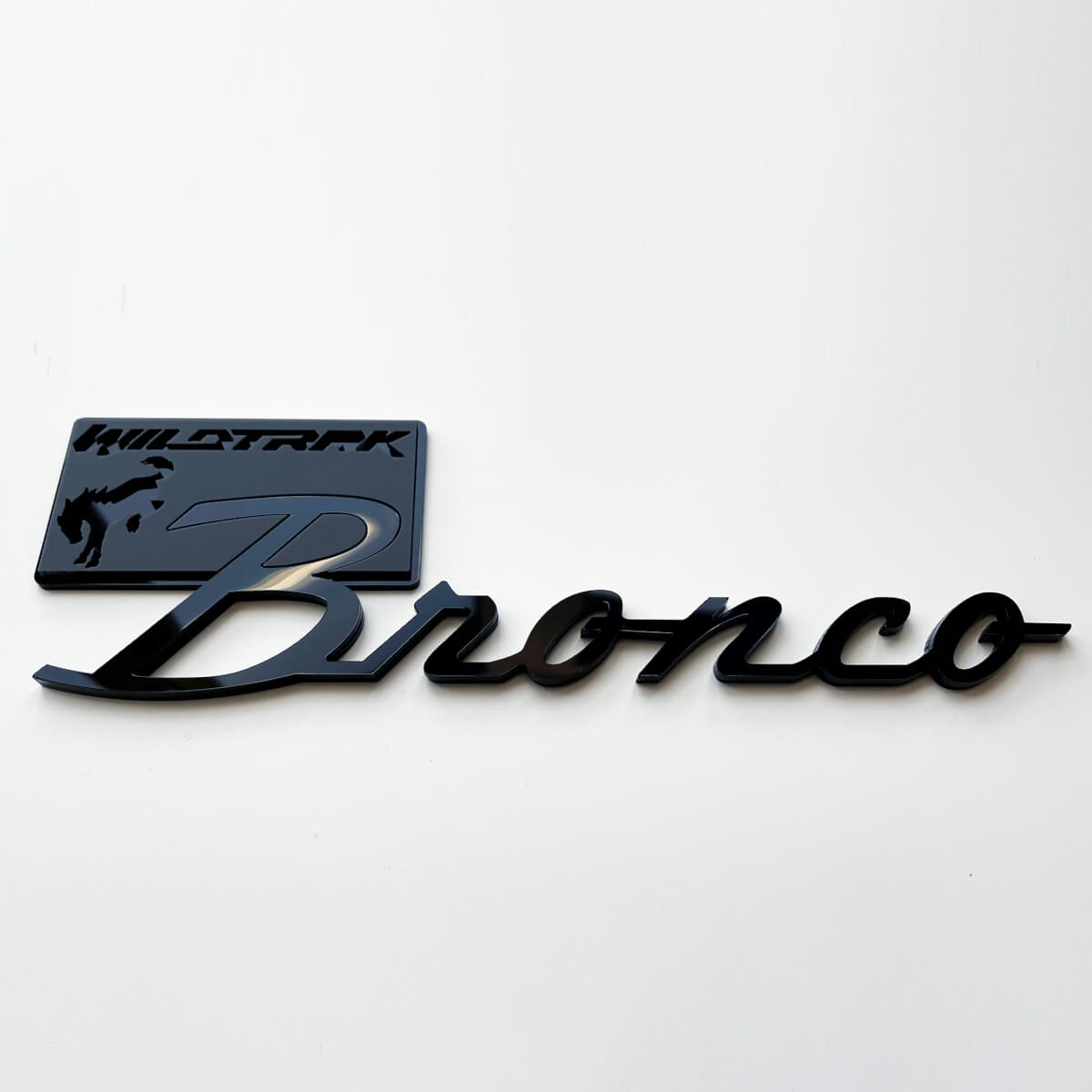 Bronco Wildtrak spatbordbadges achterklepembleem 3D-badge zwart versus grijs
