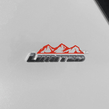 Bergen sticker sticker over Toyota 4Runner Limited badge
 3