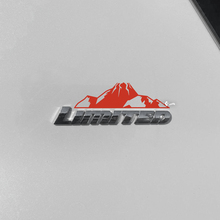 Bergen sticker sticker over Toyota 4Runner Limited badge
 4