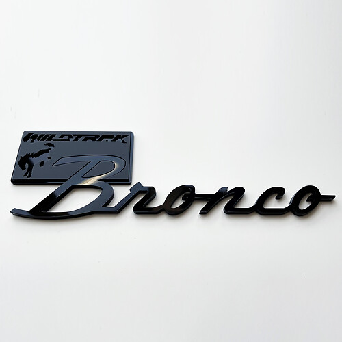 Bronco Wildtrak spatbordbadges achterklepembleem 3D-badge zwart versus grijs
