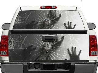 Handen achter gebroken glas achterruit of achterklep sticker sticker pick-up truck SUV auto