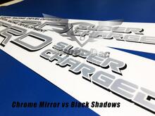 Paar TRD Super Charged Silver Chrome-spiegels met Black Shadows Toyota Racing Development vrachtwagenstickers aan bedzijde
 2